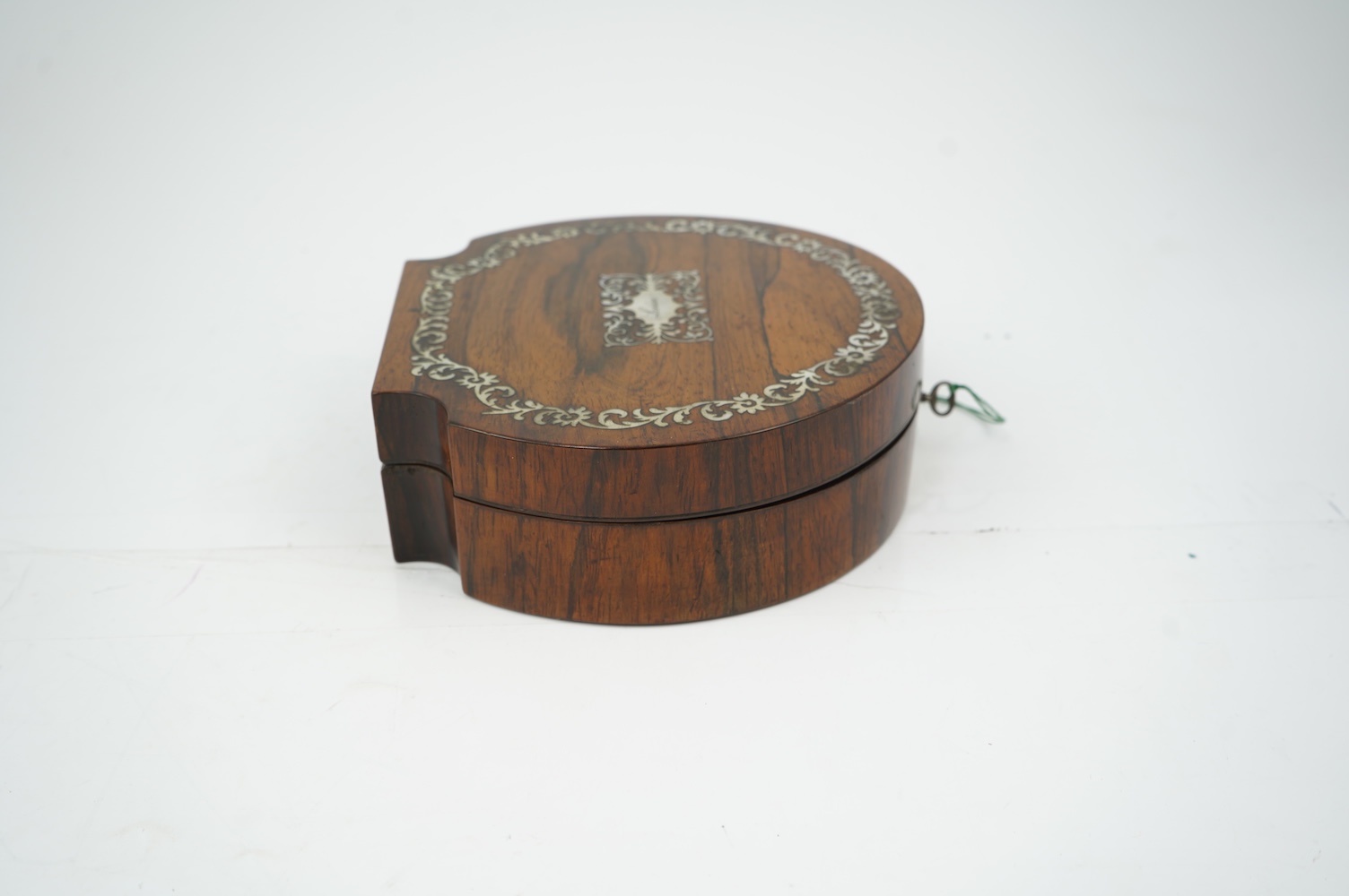 An early Victorian rosewood and mother of pearl inlaid sewing box